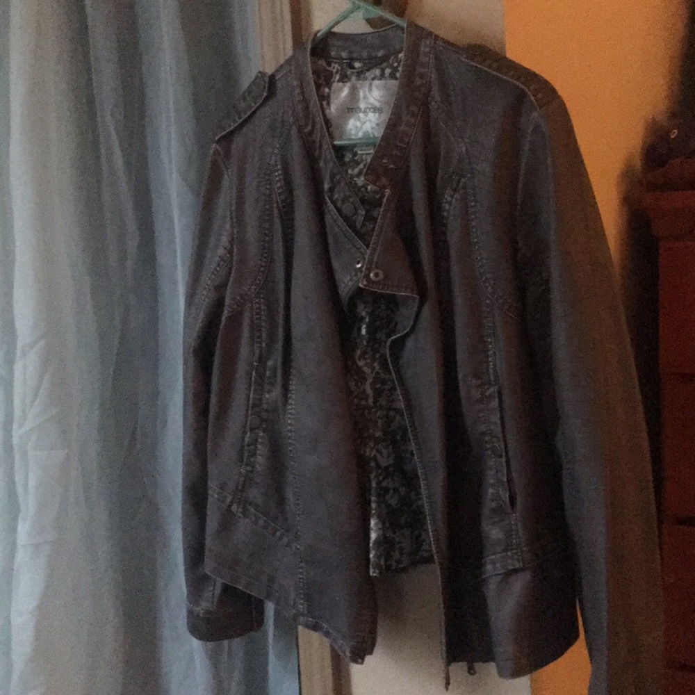 Maurice’s grey faux leather motorcycle jacket.